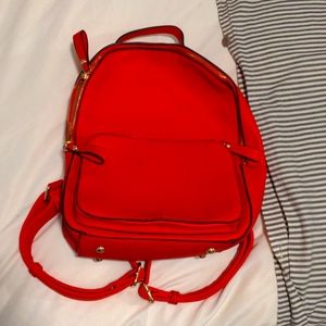 Red leather backpack